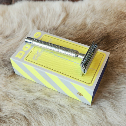 Dovo Primo II Double Edged Safety Razor on packaging, showcasing chrome-plated, knurled handle design for an exceptional wet shaving experience.