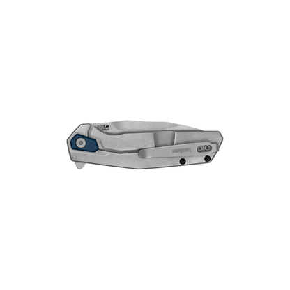 A folded Kershaw Lucid pocket knife, featuring a sleek silver finish with a blue accent near the hinge, visible screws, and a metal pocket clip, displayed against a white background.