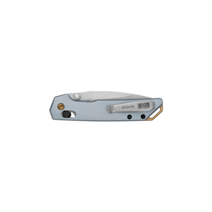 Kershaw Mini Iridium folding pocket knife with metal handle, pocket clip, flipper tab, safety slider, and visible Kershaw logo on clip.
