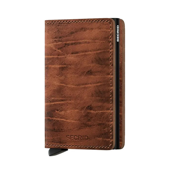 Secrid Wallets Slimwallet - Dutch Martin: Compact brown leather wallet featuring a lever for card access, aluminum card protector, and space for cash and receipts.