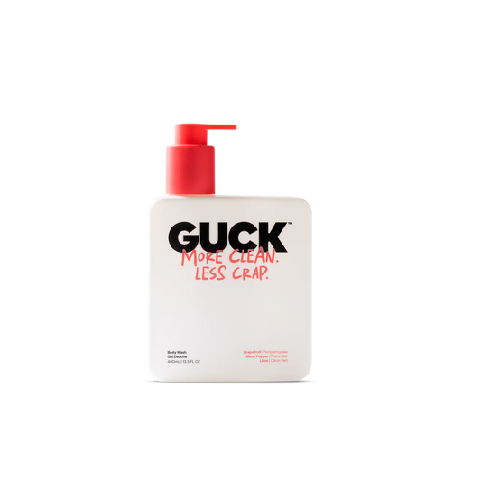 Bottle of GUCK daily wash with red pump on a white background