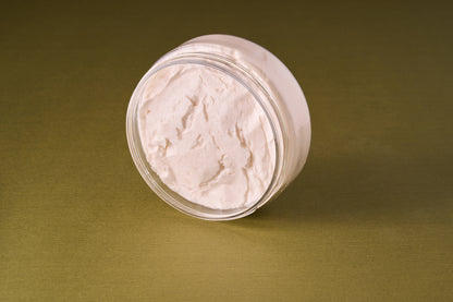 Castle Forbes Lime Essential Oil Shaving Cream 200ml in a clear jar, showcasing its whipped texture, ideal for luxurious and effective shaving.