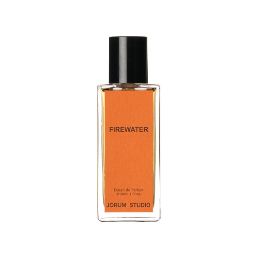 Perfume bottle labeled 'Firewater' by Jorum Studio on a white background