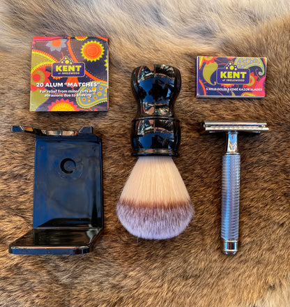 Budget Shaving Kit featuring a synthetic shaving brush, chrome safety razor, razor blades, alum sticks, and stand, embodying classic shaving essentials from Kent of Inglewood.