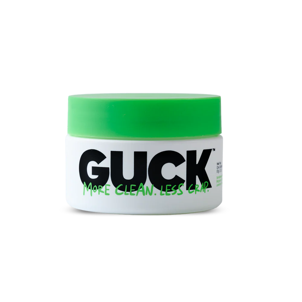 Green and white container that says Guck in black text