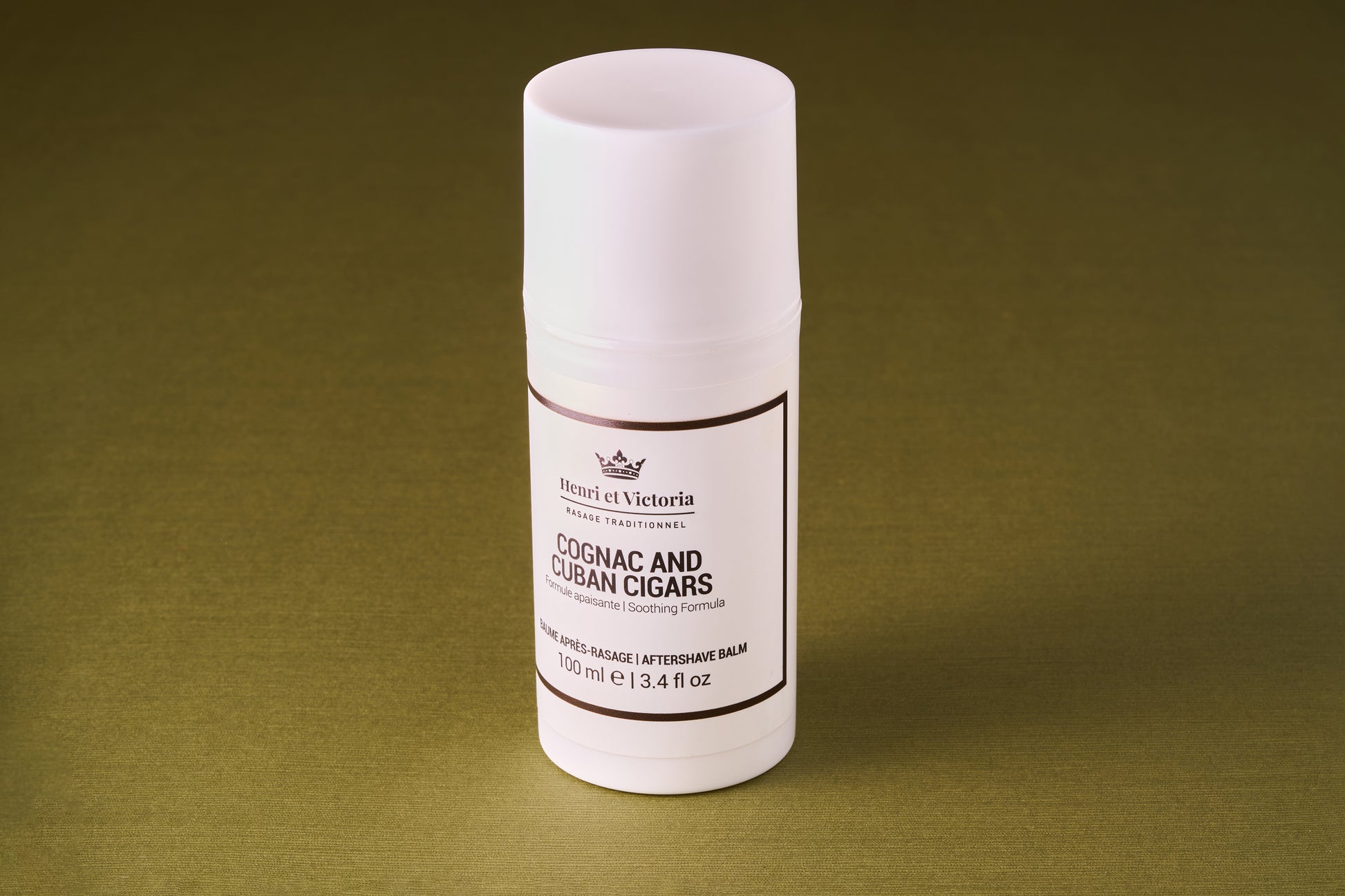 Henri et Victoria - Cognac and Cuban Cigars Aftershave Balm, 100ml, in a sleek white cylindrical container, soothes and hydrates skin post-shave with notes of tobacco and cognac.