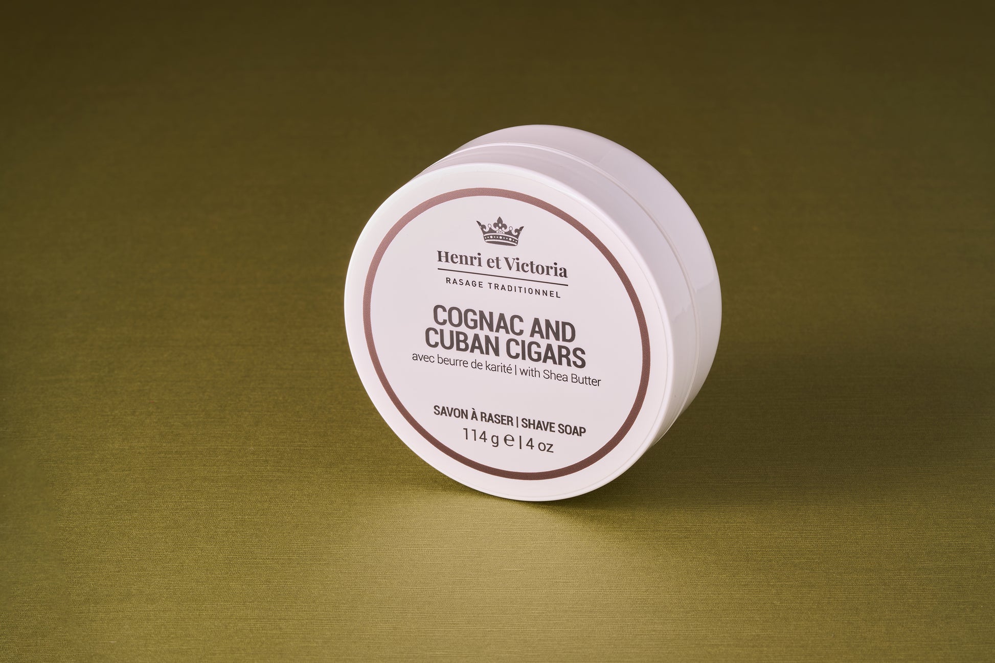 Henri et Victoria - Cognac and Cuban Cigars Vegan Shave Soap in a round white jar, featuring a luxurious scent and shea butter for a smooth shaving experience.