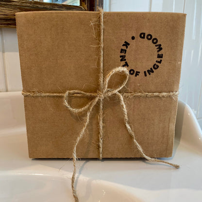 Gift-wrapped Classic Shaving Kit by Kent of Inglewood, featuring a knurled safety razor, badger shaving brush, and stand for a sustainable, comfortable shave.