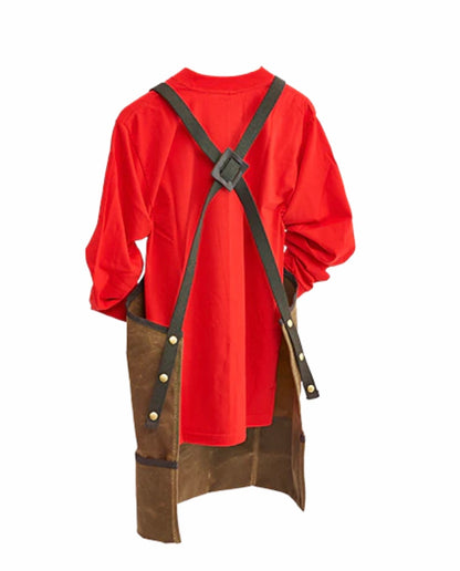 Frost River Shop Apron ESB: A durable, waxed-canvas apron with black straps and brass hardware, perfect for versatile use in various work environments.