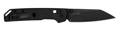 Kershaw Iridium Reverse Tanto pocket knife with black D2 tool steel blade, visible pocket-carry clip, and thumb-stud/flipper for one-handed opening, showcasing precision-focused design.