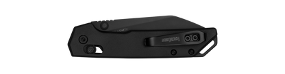 Kershaw Iridium Reverse Tanto pocket knife, closed and compact, featuring a sleek black finish and Kershaw pocket-clip, ideal for precision tasks.