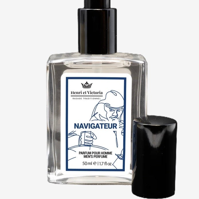 Henri et Victoria - Navigateur Perfume, a 50 ml glass bottle with a black spray nozzle and cap, featuring a bearded navigator illustration on the label.