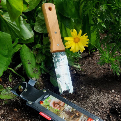 Nisaku Hori Hori Knife with a wooden handle and depth-marked stainless-steel blade, shown with its sheath, ideal for versatile gardening tasks.