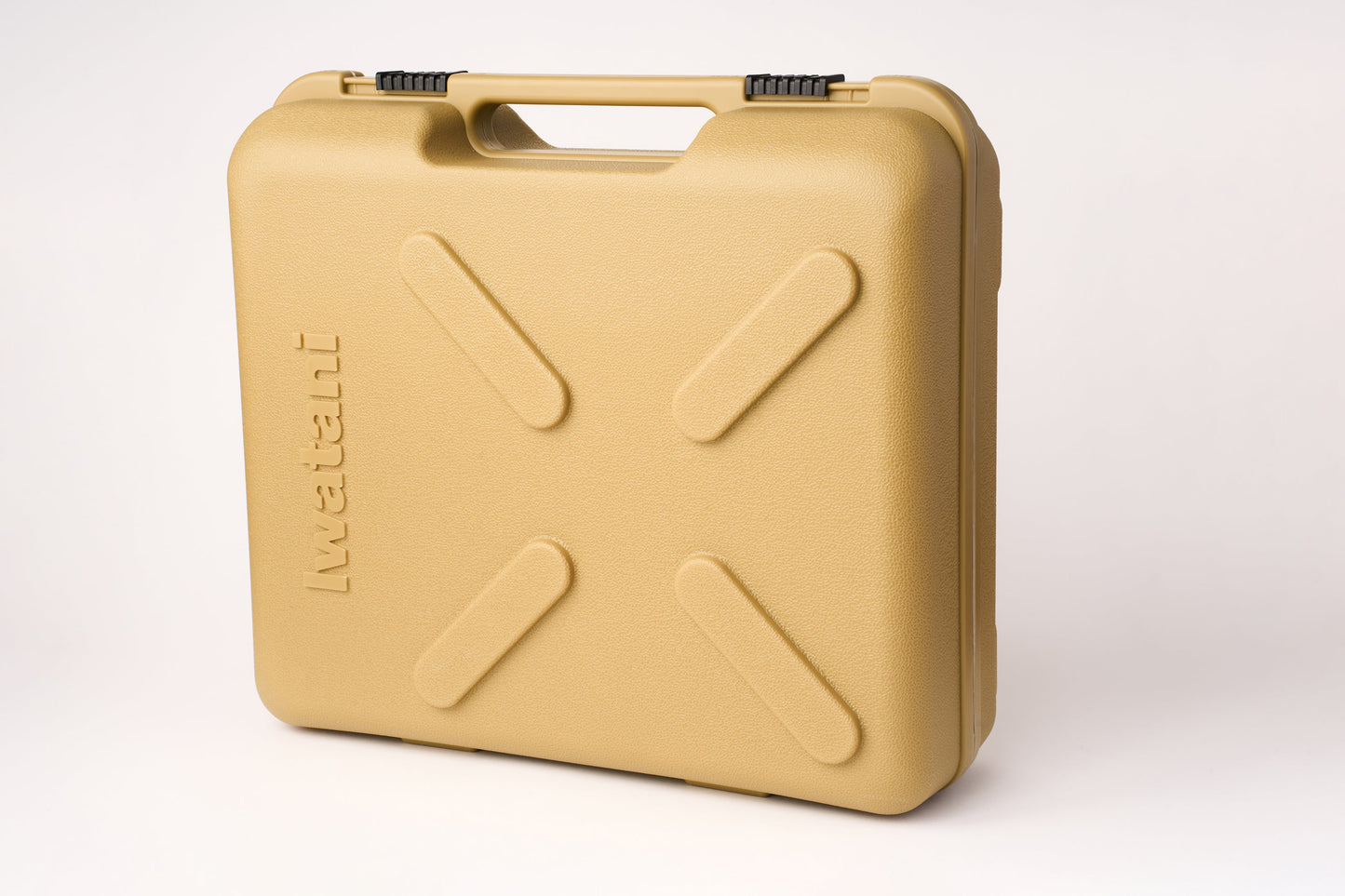 A tan-colored, hard plastic carrying case with a handle and textured surface, featuring the Iwatani brand name embossed on the side and raised X-shaped details on the front—perfect for securely transporting your Iwatani Cassette Konro "Tough Maru" Portable Stove or butane stove.
