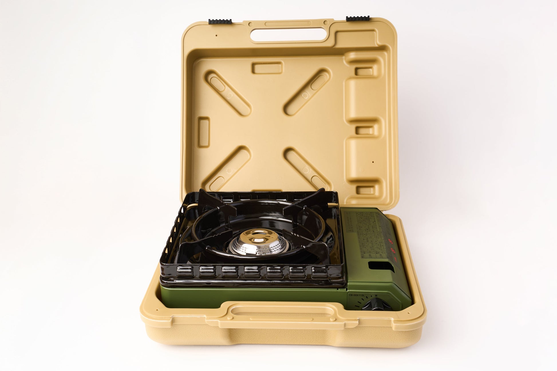 A green Iwatani Cassette Konro "Tough Maru" portable stove with a black burner is shown inside an open tan carrying case against a white background.
