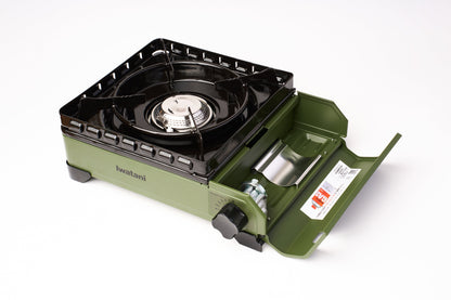 A green Iwatani Cassette Konro "Tough Maru" Portable Stove featuring a black grate, an open compartment displaying a butane canister, and an ignition knob, set against a white background.