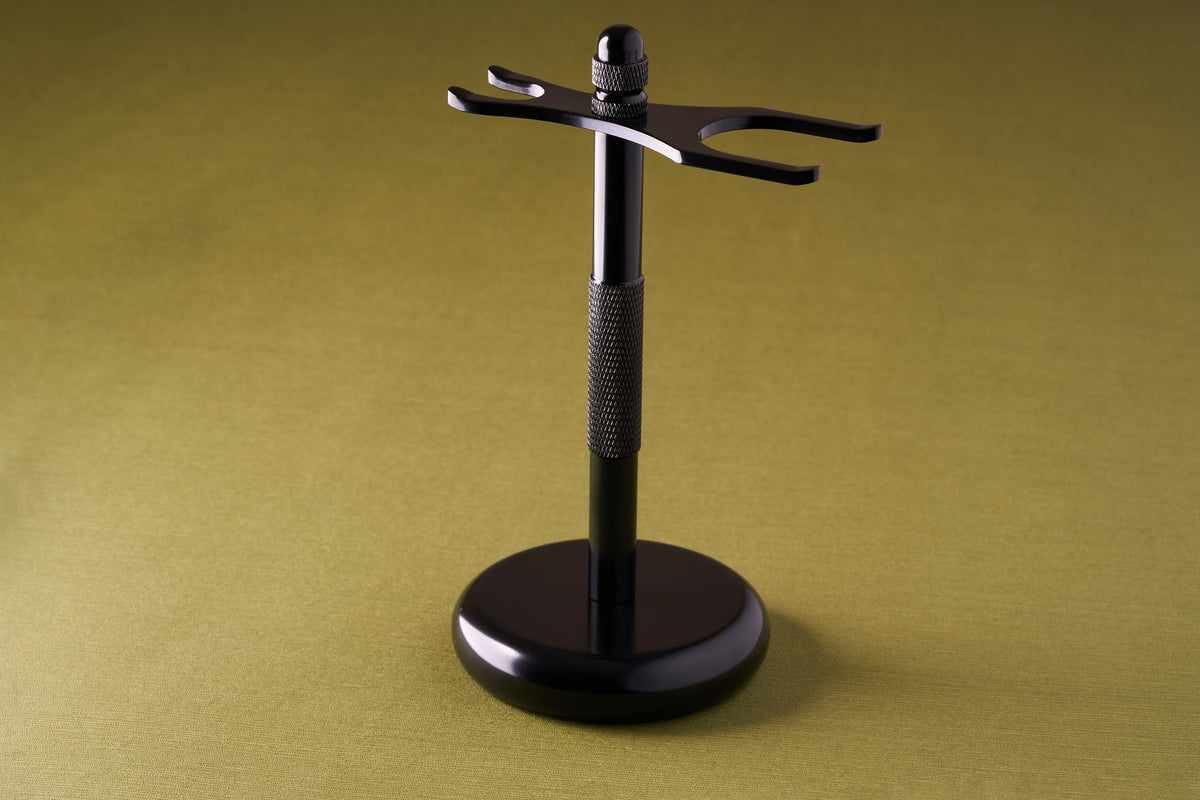 Kent of Inglewood Brush and Razor Stand, featuring a sturdy metal design with a knurled grip, perfect for organizing your shaving essentials.