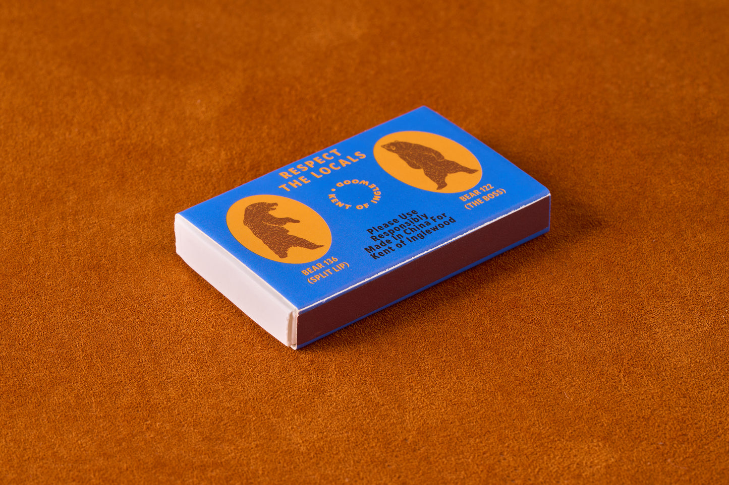 Kent of Inglewood Trail Matches box featuring Alberta grizzlies, with Respect the Locals slogan, ideal for campfires or emergency kits.