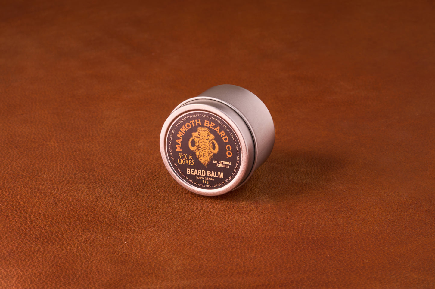Mammoth Beard Co. Beard Balm Sex & Cigars, 51g tin, offers light hold and moisture with a smoky, sweet scent, ideal for taming unruly beards.