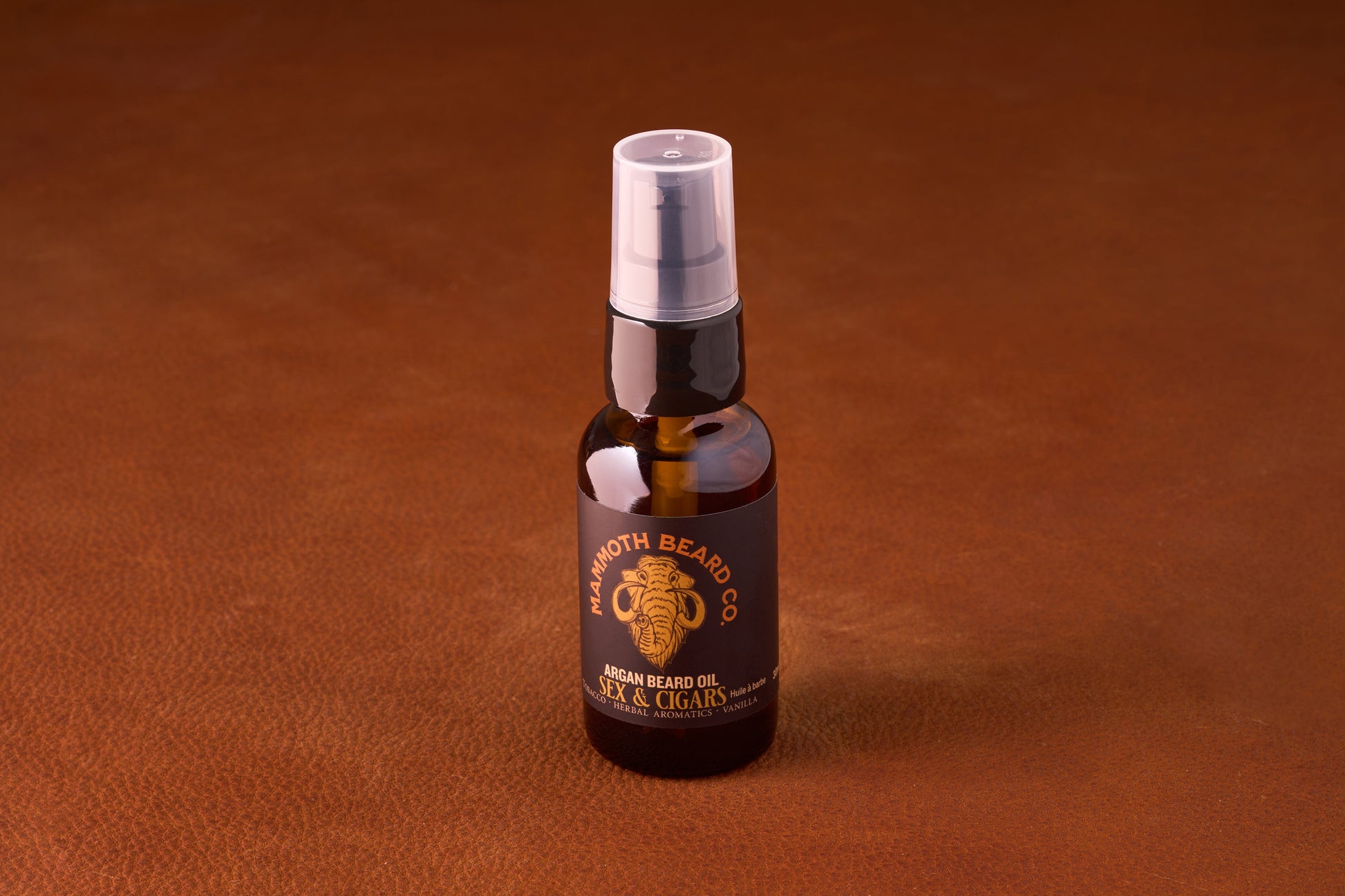 Mammoth Beard Co. Beard Oil - Sex & Cigars 30ml in amber-glass bottle with pump, featuring a blend of tobacco, herbal aromatics, and vanilla scents.