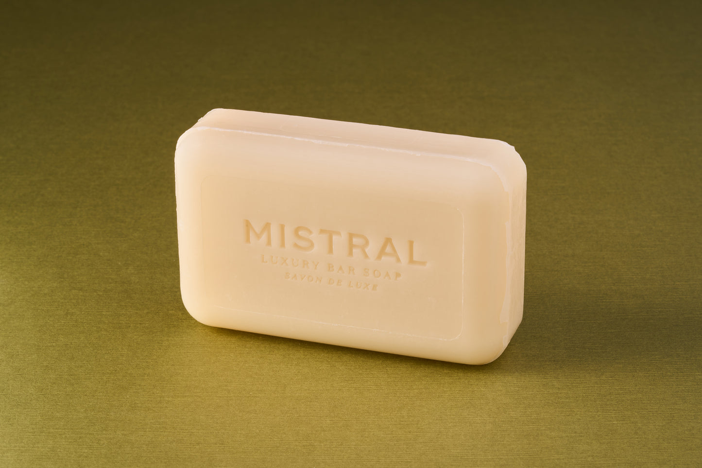 Mistral Marbles Citrus Bar Soap, embossed with brand name, offers a luxurious, long-lasting lather and zesty citrus fragrance, embodying French refinement.