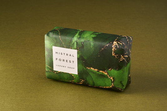Mistral Marbles Forest Bar Soap wrapped in luxurious green marble-patterned paper, promising a smooth, long-lasting lather with a rich forest fragrance.