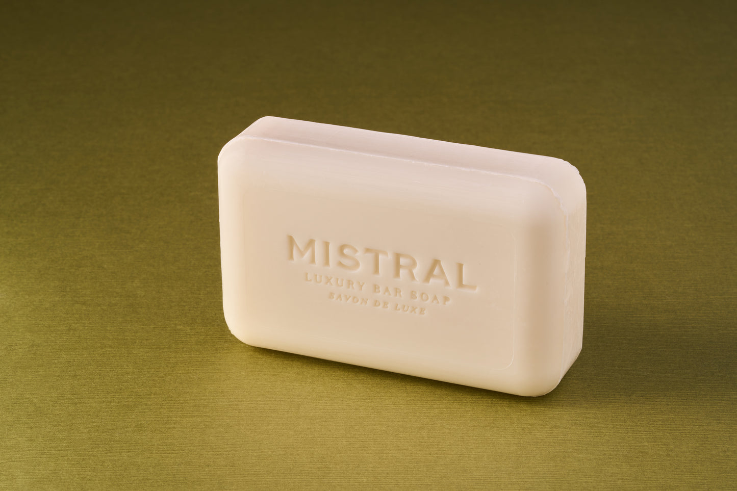 Mistral Marbles Salt Bar Soap, a luxurious, cream-colored soap with a smooth lather and rich fragrance, stamped MISTRAL Luxury Bar Soap on the surface.
