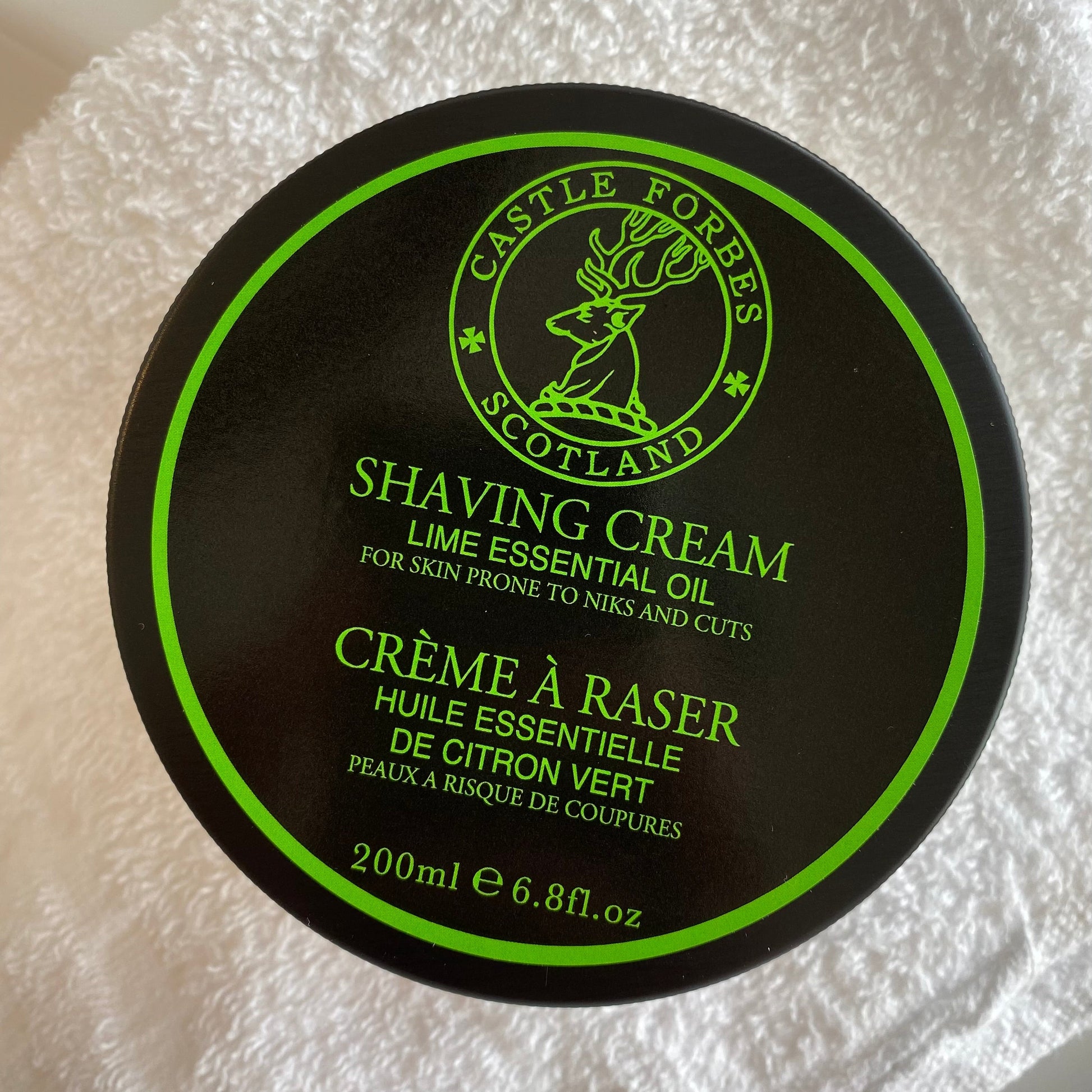 Nolan's All-In-One Shaving Kit features a black Castle Forbes Lime Shaving Cream container, ideal for skin prone to nicks and cuts.