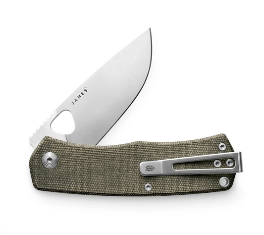 James Folsom folding pocket knife with partially open stainless steel blade, olive-green canvas handle, and reversible metal pocket-clip for versatile carry.