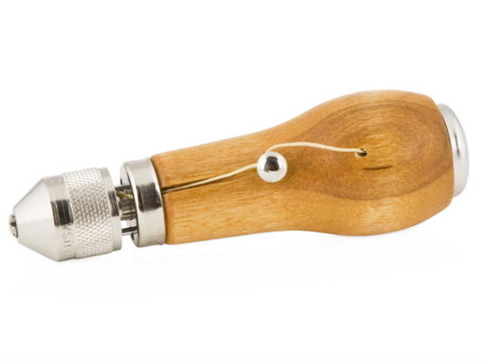 Wooden-handled tool with metallic end on a white background