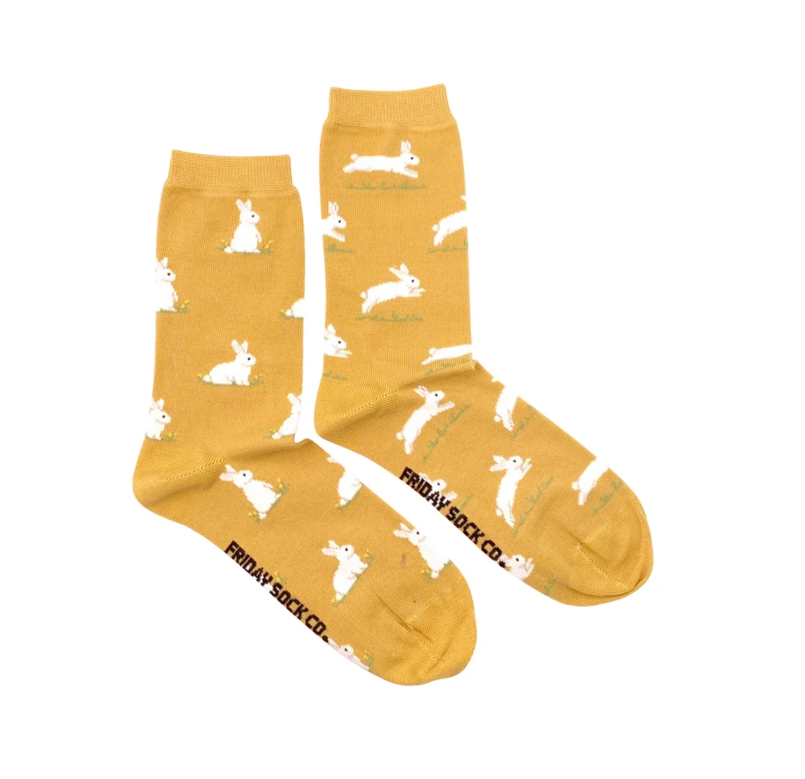 Mustard yellow Friday Sock Co. Bunny Womens socks featuring a repeating pattern of white bunnies, with the brand name printed on the foot.