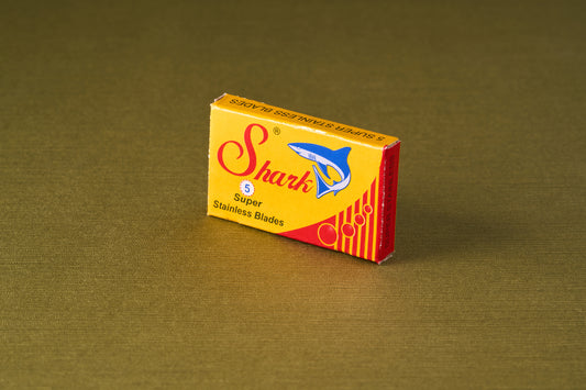 Shark Super Double Edge Razor Blades in a small box, offering sharpness and comfort for sensitive skin. Buy 10 packs for a 10% discount.