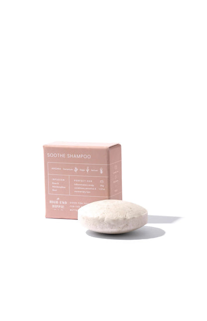 The High End Hippie Soothe Shampoo Bar with geranium, sage, and vetiver aroma, ideal for sensitive scalps, displayed with its eco-friendly pink retail box.