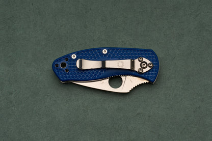 A closed Spyderco Ambitious Blue Lightweight CPM folding pocket knife with a textured blue handle and a silver pocket clip, designed for easy daily-carry.