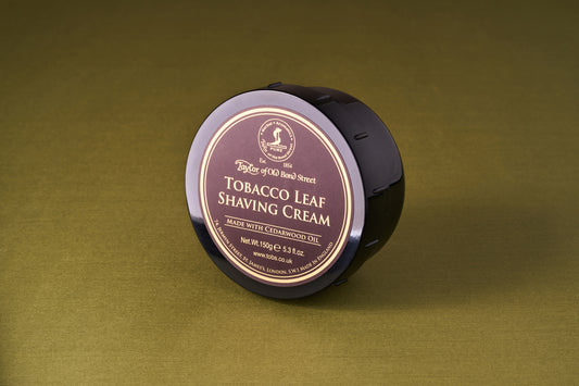 Taylor of Old Bond Street Tobacco Leaf Shaving Cream in a dark tub, known for its nostalgic scent and excellent lather, perfect for a classic shave.