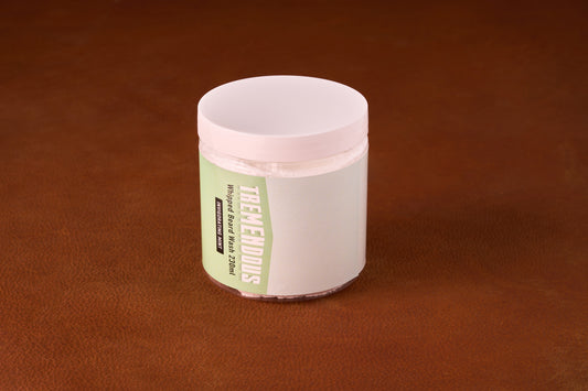 Tremendous PH Balanced Whipped Beard Wash in a clear jar with a white lid, offering gentle, mint-scented cleansing for sensitive skin and beards.