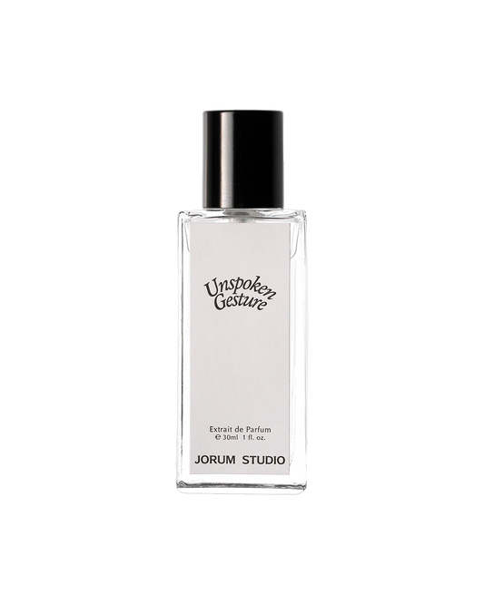 Perfume bottle labeled 'Unspoken Gesture' by Jorum Studio on a white background