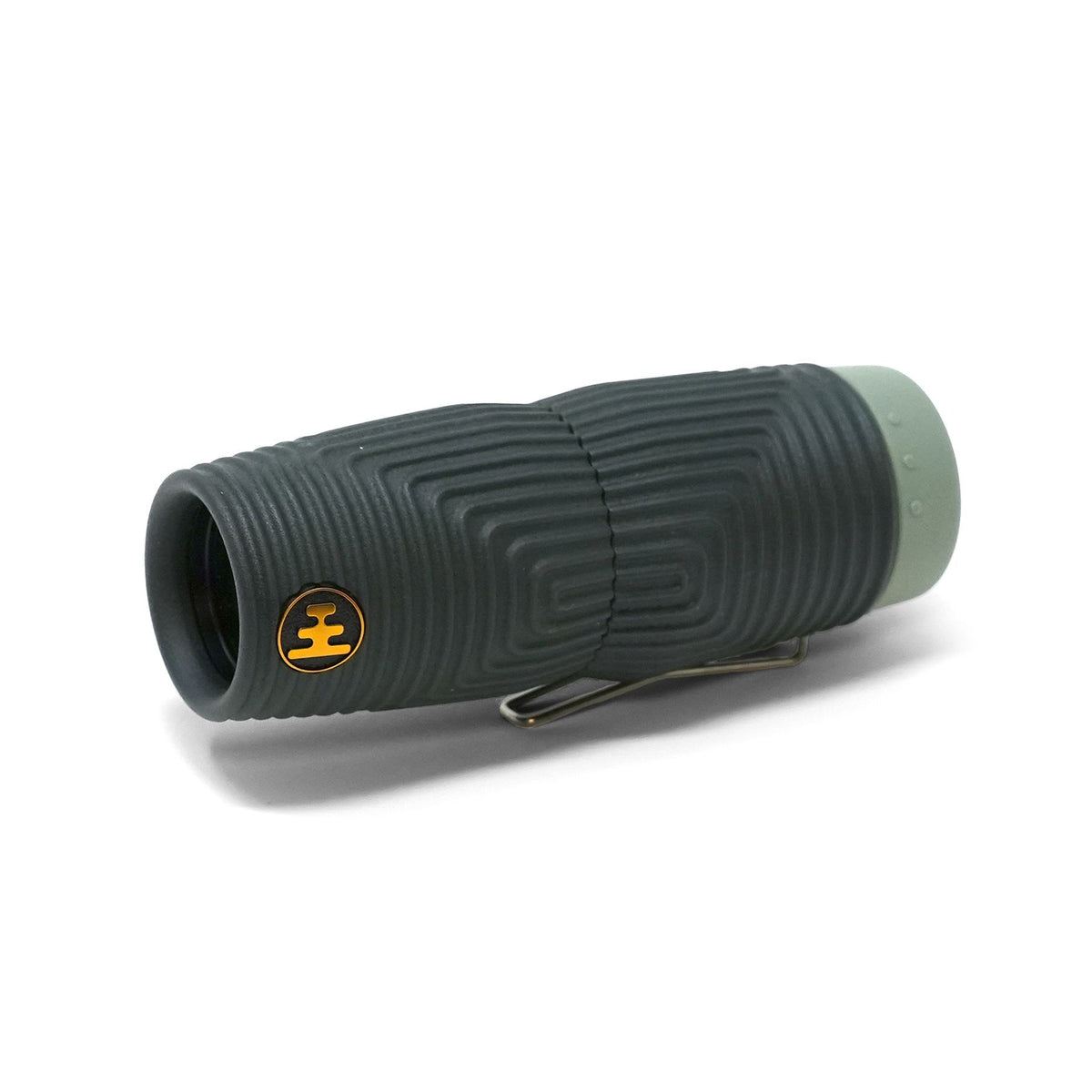 A compact NOCS Provisions Zero Tube 10x25 Monocular with a textured black and gray finish and a gold-and-black logo on the side, shown from a slight angle against a white background.