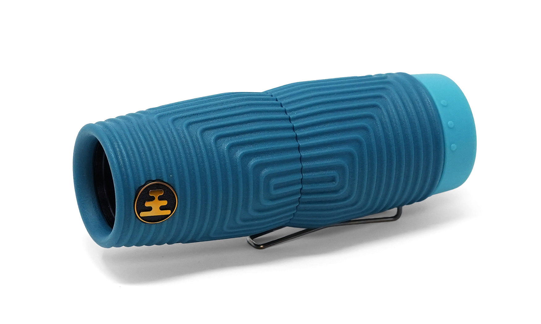 A NOCS Provisions Zero Tube 10x25 Monocular in blue, featuring a textured cylindrical body with a clip and a yellow circular logo on one end, is shown lying on a white background.