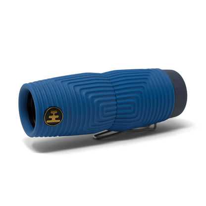 NOCS Provisions Zero Tube 10x25 Monocular with ribbed silicone grip and metal clip, showcasing its lens and compact, rugged design for outdoor adventures.