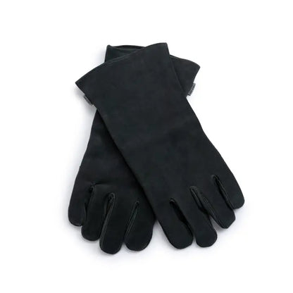 Barebones Open Fire Gloves, crafted from full-grain cowhide, feature a long gauntlet design for safe handling over hot coals, enhancing outdoor cooking experiences.