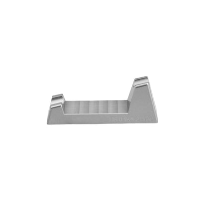 Henson Razor Stand cradles a traditional safety razor for drip-drying, featuring a minimal design with machined aluminum supports and a slotted base for stylish storage.