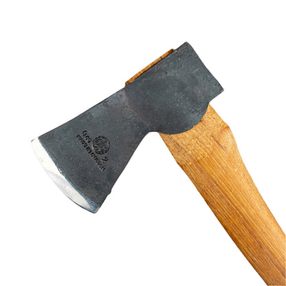 Ultimate Axe Bundle: Features a forged steel hatchet with a wooden handle, accompanied by an Axe Handbook, guidebook, and sharpening stone for versatile woodwork.