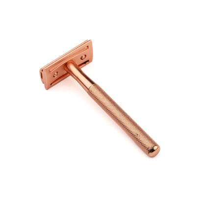 Less Than Perfect Hoxton Shave Co. Rose Gold DE Safety Razor with a textured handle and removable head, ideal for a close, eco-friendly shave.