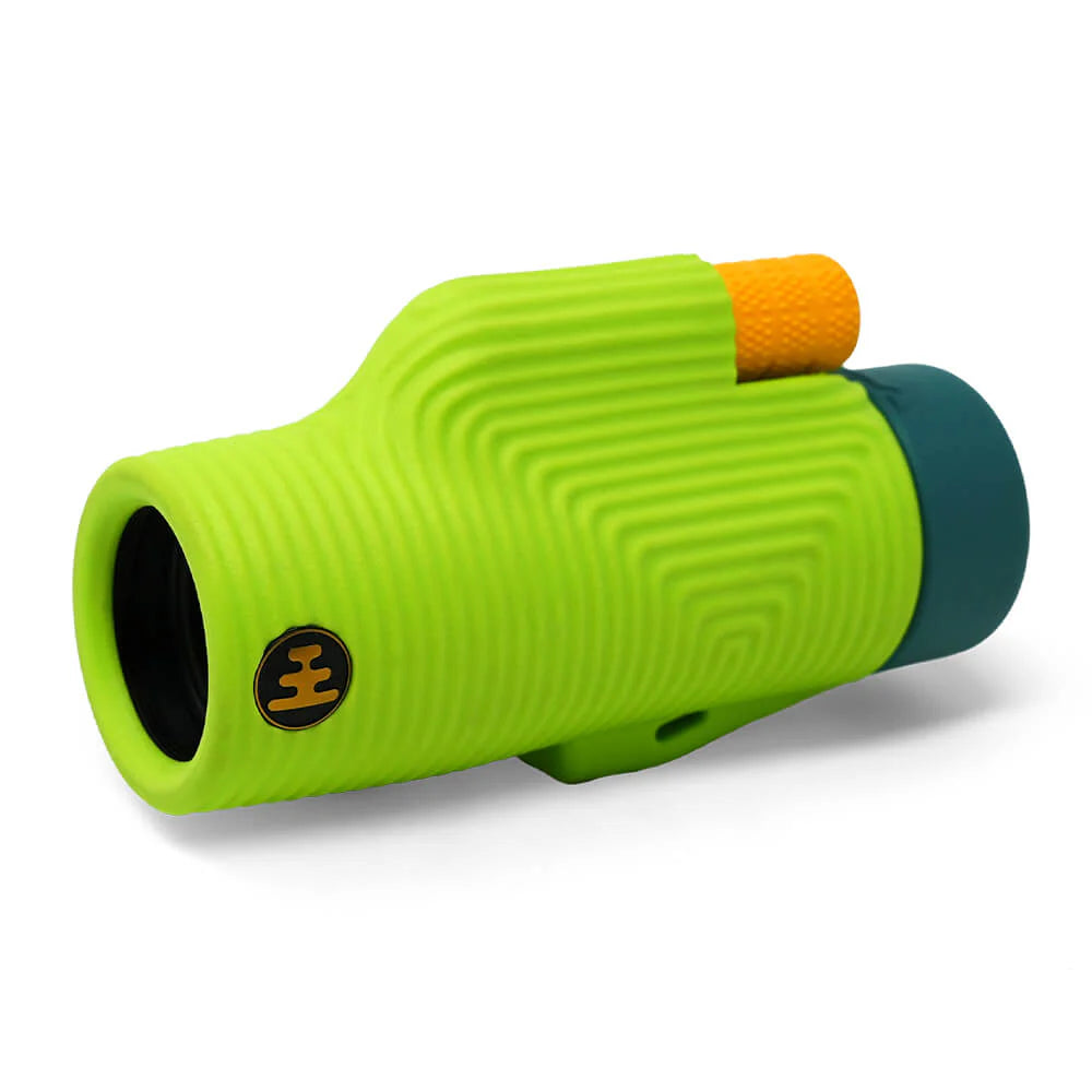 NOCS Provisions Zoom Tube 8x32 Monocular in lime-green, featuring an orange focus knob, teal eyepiece, and rugged, water-resistant design for adventurous, nature-focused exploration.