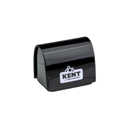 Kent of Inglewood Razor Blade Bank, a small black metal tin for safe disposal of used razor blades, featuring a secure top slot for blade insertion.
