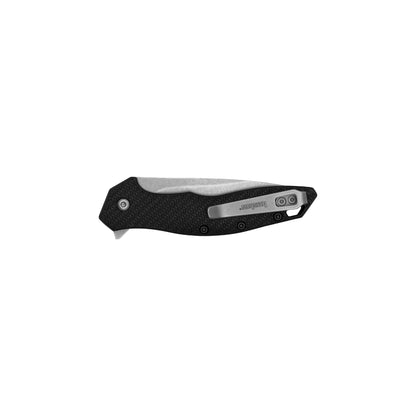 Kershaw Shoreline pocket knife with textured black handle, stainless-steel clip, and a flipper tab for easy opening, reflecting durability and craftsmanship.