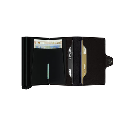 Secrid Wallets Twinwallet, a slim black RFID-blocking wallet, features a metal money clip for euros and multiple card slots, ideal for organized minimalists.
