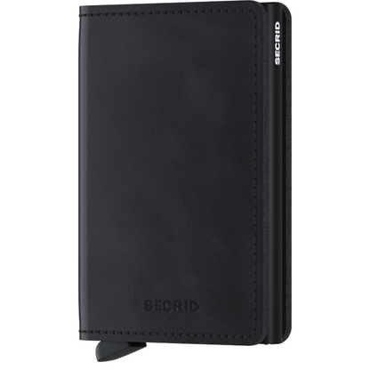 Secrid Wallets Slimwallet - Vintage: A compact, leather-covered aluminum card protector with RFID blocking, designed to stylishly fan out 2-6 cards using a signature lever.