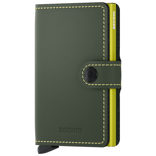Secrid Wallets Miniwallet - Matte: Compact dark-green leather wallet with snap closure, revealing a bright yellow Cardprotector. Features RFID blocking and signature card fanning lever for secure storage.